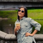 portrait-young-attractive-female-drinks-coffee-go-summer-park-near-lake_613910-3489